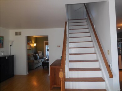 Spacious Open Concept with new wood flooring