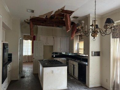 Kitchen with gas cooktop, sink, double wall oven, 