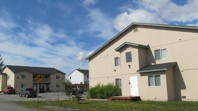 2615 & 2615 E 64th Ave - side