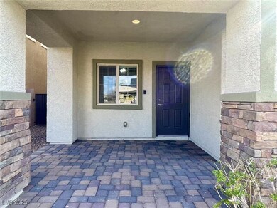 Doorway to property featuring stucco siding