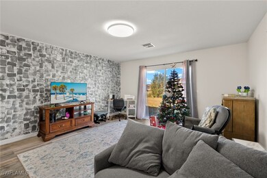 Living room featuring light hardwood / wood-style