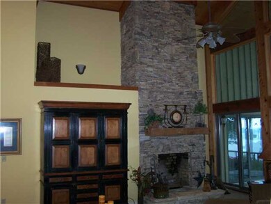 Large stone fireplace will warm up those cool fall