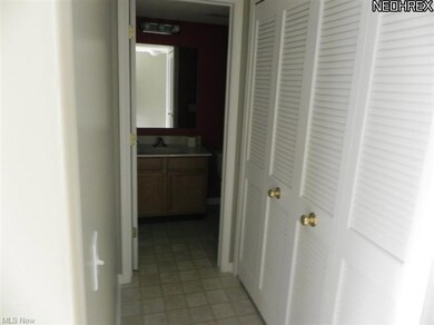 The furnace and hot water take are behind the doors on the right and the 1/2 bath is straight ahead on the 1st floor.