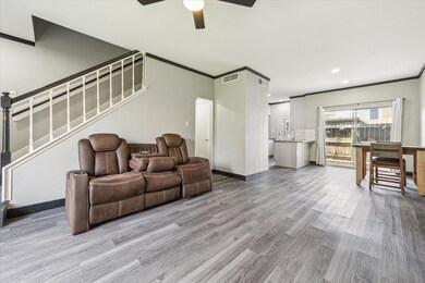 View of living, dining, and kitchen areas.  Nice o