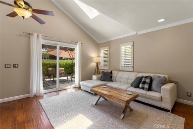 Light, bright family room invites indoor outdoor living. So Cal living at its best