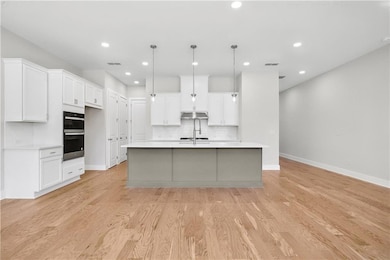 **Image displayed is the exact same layout. However, the finishes will be different for the home listed.**