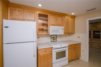 Remodeled Kitchen with Solid Surface Counters. Sli