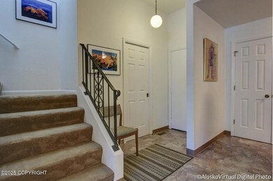 Entry and Door to Half Bath