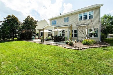 Lovely back yard. Level with a lot of trees and sh