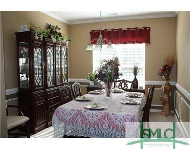 Dining Room. Formal dining room has crown molding,