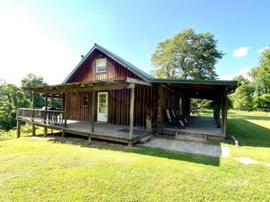 Left side and rear of house