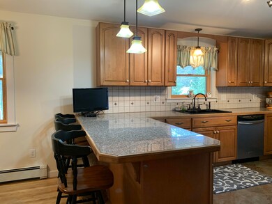 Kitchen With Seating at Bar