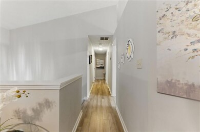 Corridor with an upstairs landing, light wood-styl