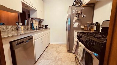 Kitchen featuring stainless steel appliances, a s
