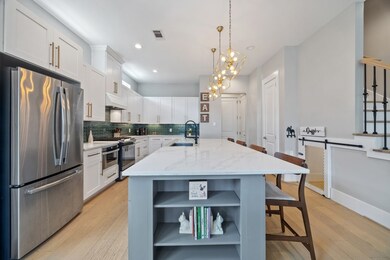 Chef’s kitchen with stainless steel appliances, ex