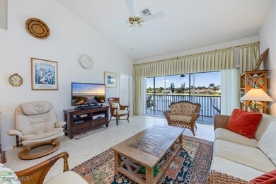 Living room featuring light tile patterned floorin