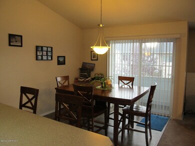 Dining area w/ covered balcony