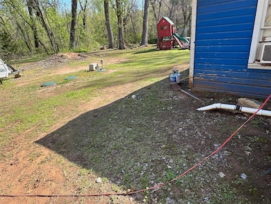 View of yard featuring a playground