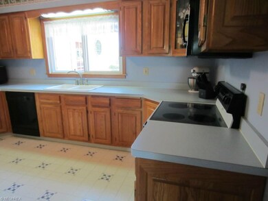 Remodeled kitchen with plenty of counters and cabi