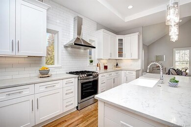 Full height subway tile + gorgeous kitchen windows