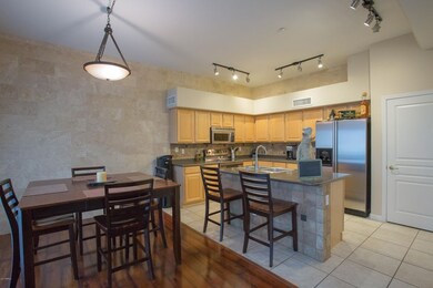 Kitchen & Dining Area - Travertine wall!