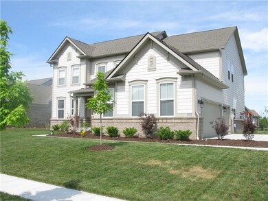 View of Home Showing 3 Car Garage - Side Load.