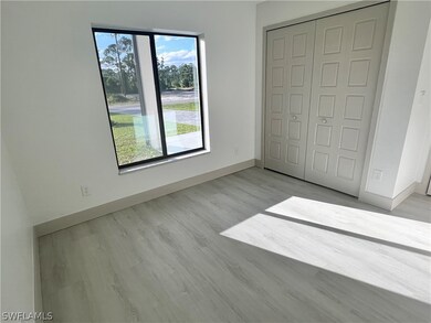 717 Eisenhower Blvd, Lehigh Acres, FL 33974 - photo 7