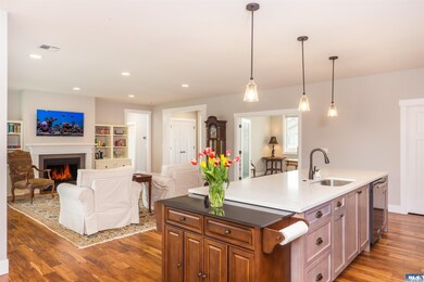 The main living space encompasses the living room, the kitchen and the dining area