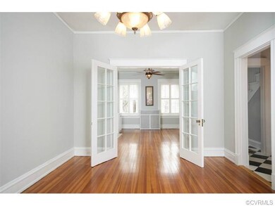 The dining room has gorgeous French doors to the l