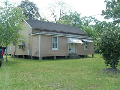 Photo. Front / Side view of main home