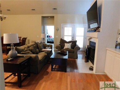 Great room features hardwood floors, ventless gas 