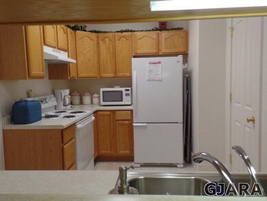 View of Kitchen from Bar area in Dining