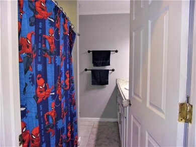 Bathroom:  This bath services bedrooms 2 and 3.