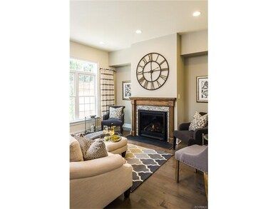 Outstanding Family Room with Gas FP and custom man