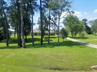 House sits way back from the highway with beautifu