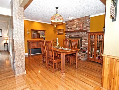 Large dining area with a warm fireplace which open