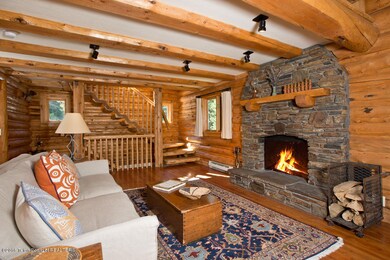 7 Living Room with Fireplace + Stairs