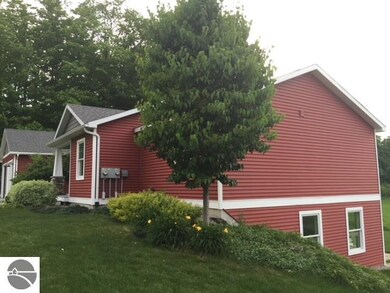 7562 E Meadows Dr, Cedar, MI 49621 - photo 3