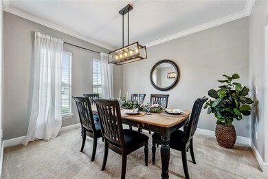 FORMAL DINING ROOM that includes CROWN MOLDING, a 