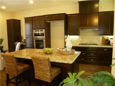 Gigantic kitchen with prep/conversation island. Be