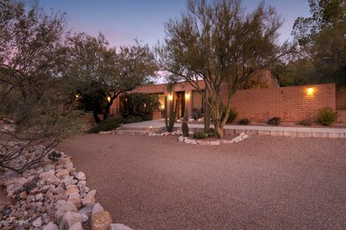 View of front from wide winding driveway