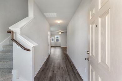 Durable luxury vinyl flooring throughout the first