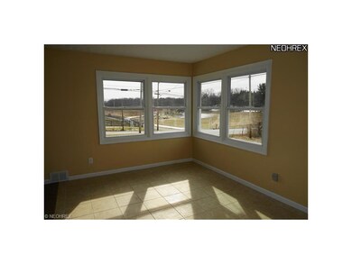 Dining room with ceramic tile floor and great view