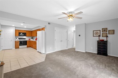 Open floor plan view of the eat in kitchen and liv