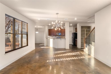 Kitchen with finished concrete floors, a notable 