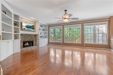 Family room with gas fireplace, formal living and dining room for a spacious main level.