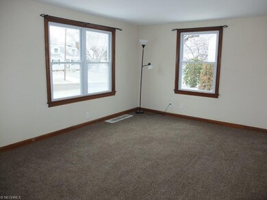 Living room with new carpet.