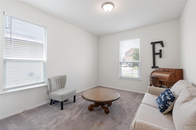 Downstairs, front room. Office/Playroom/ or Bedroom Potential