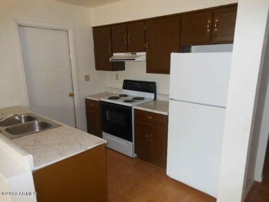 Kitchen includes Refrigerator