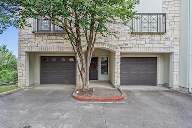 View of front of home featuring a garage, drivewa